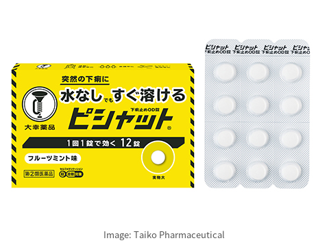 Yellow Japanese Pishat antidiarrheal OD 12-tablet box beside its blister sheet